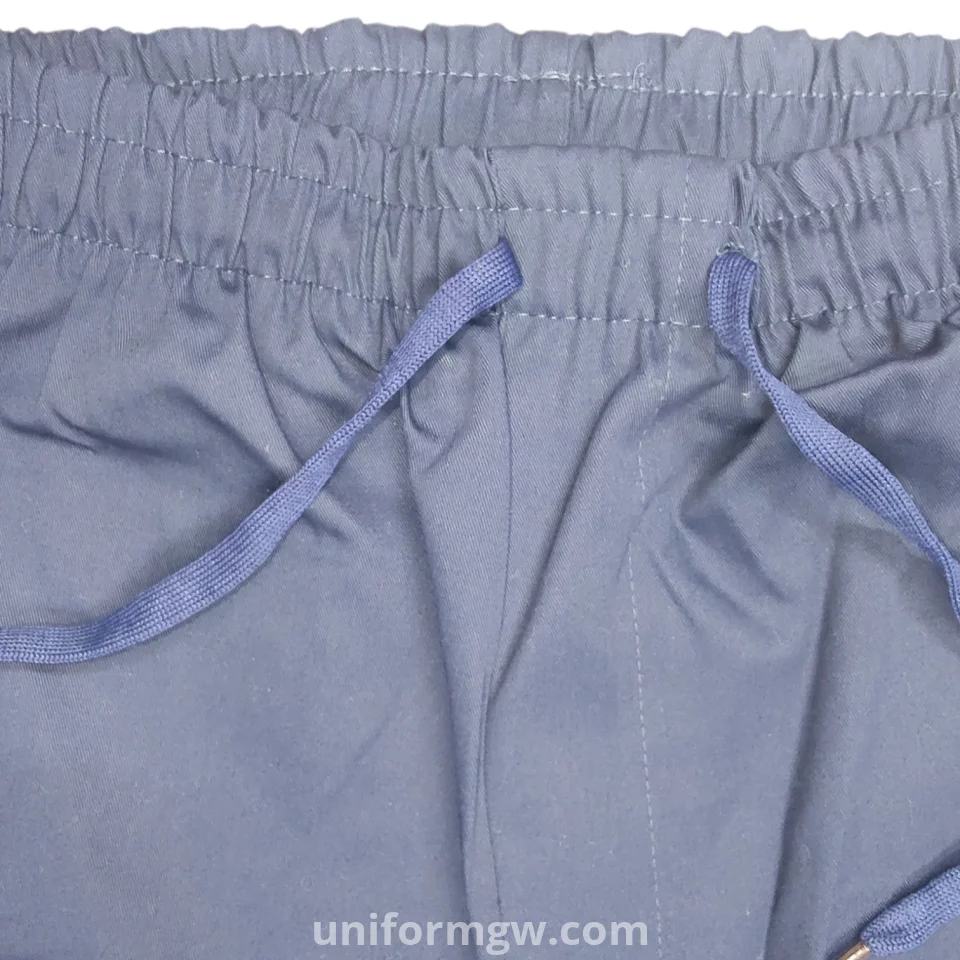 Elastic-waisted gabardine pants with with two front pockets