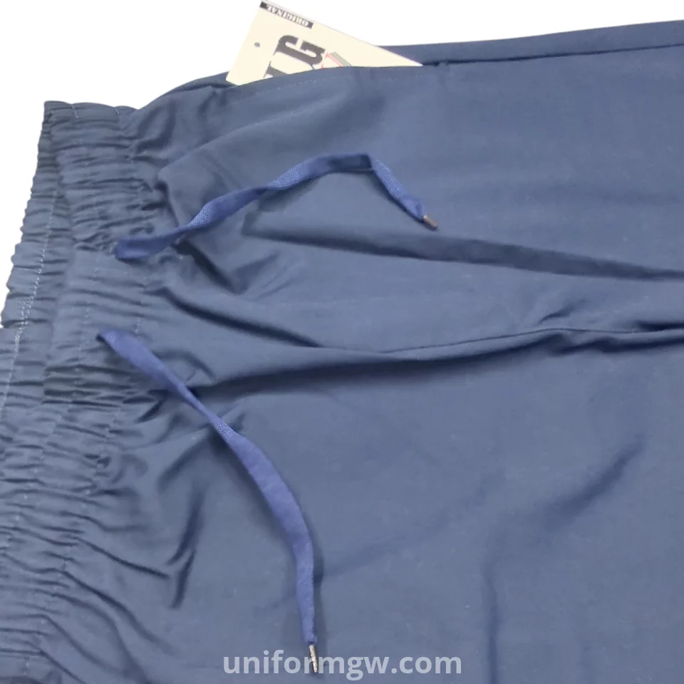 Elastic-waisted gabardine pants with with two front pockets